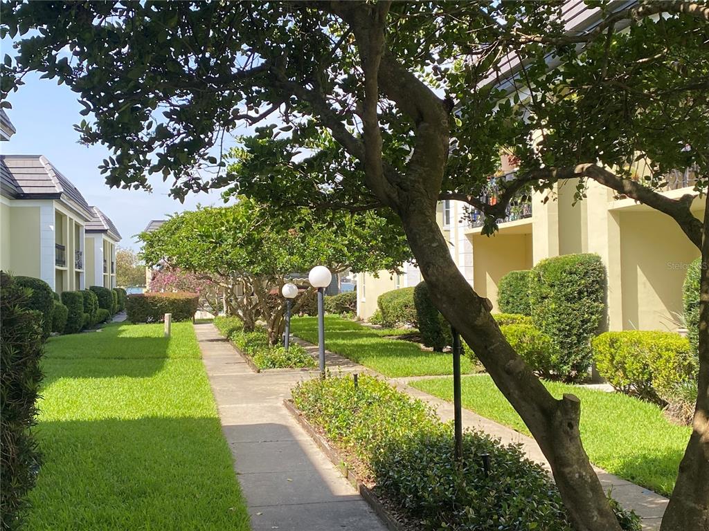 1500 Gay Road, Unit 4D Winter Park, FL 32789 - Photo 2 of 15 a front view of a house with a yard