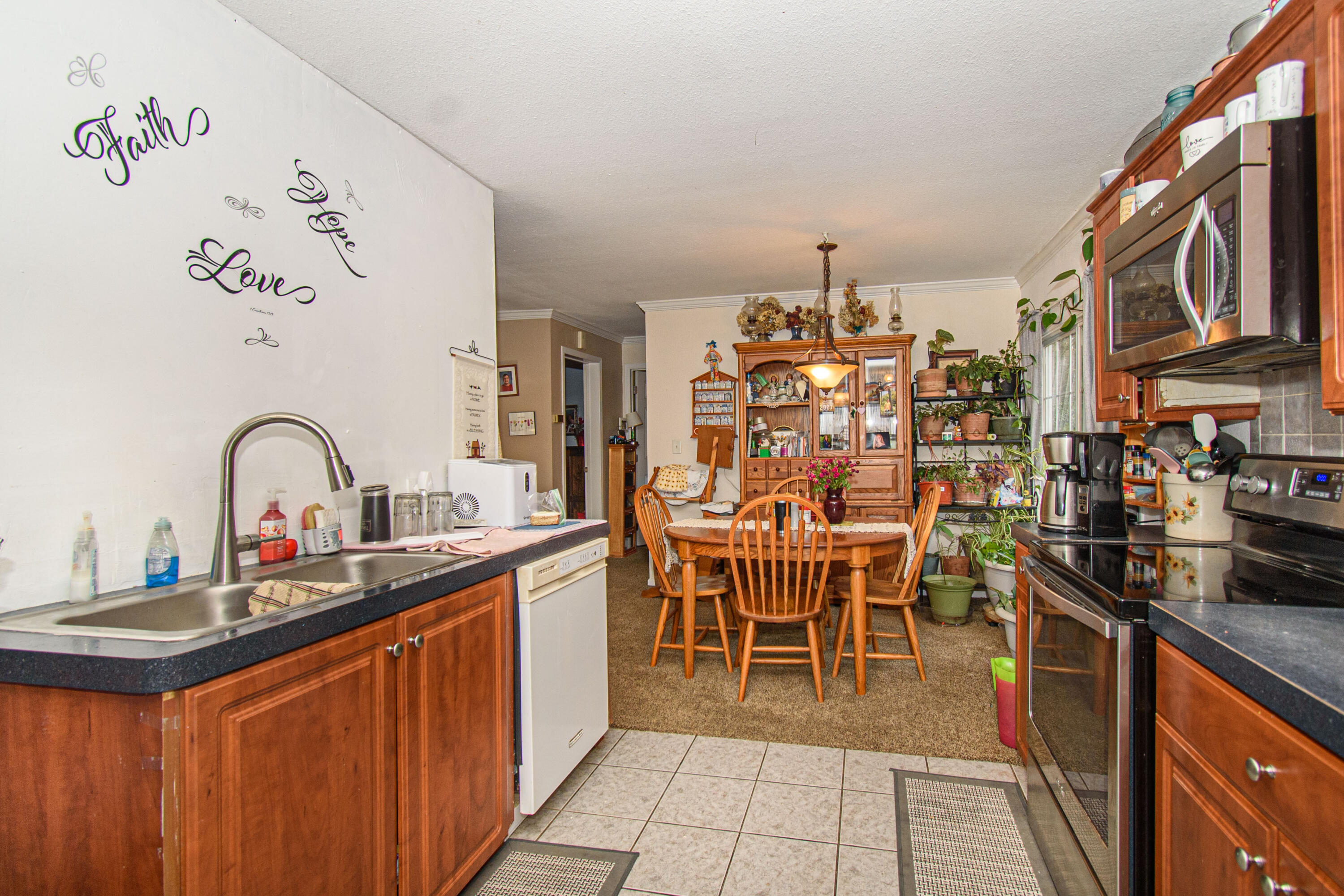 162 Mountain Laurel Way Northeast Check, VA 24072 - Photo 12 of 49 a kitchen with stainless steel appliances granite countertop a sink and cabinets