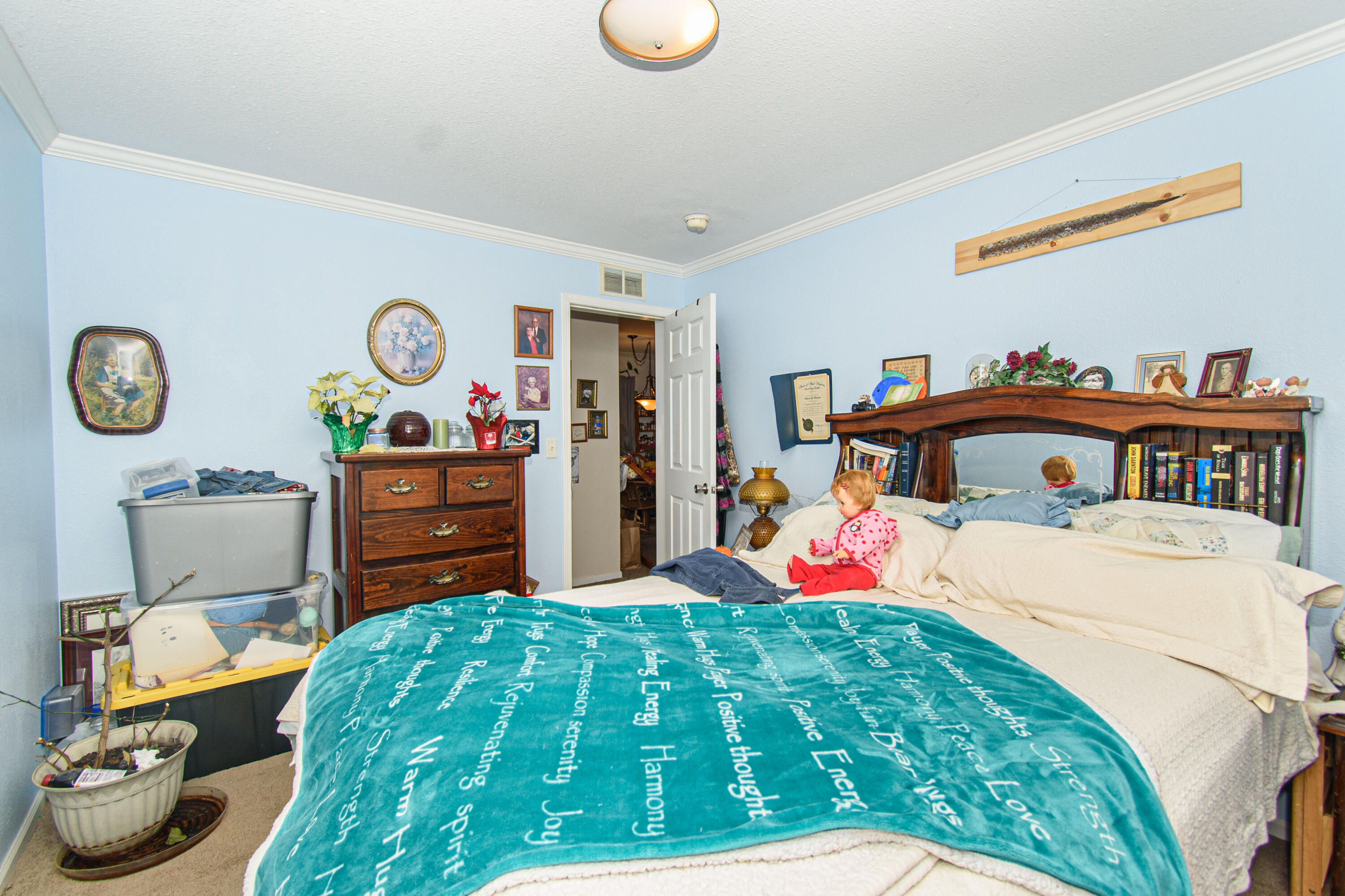 162 Mountain Laurel Way Northeast Check, VA 24072 - Photo 21 of 49 a bedroom with a bed and a chandelier