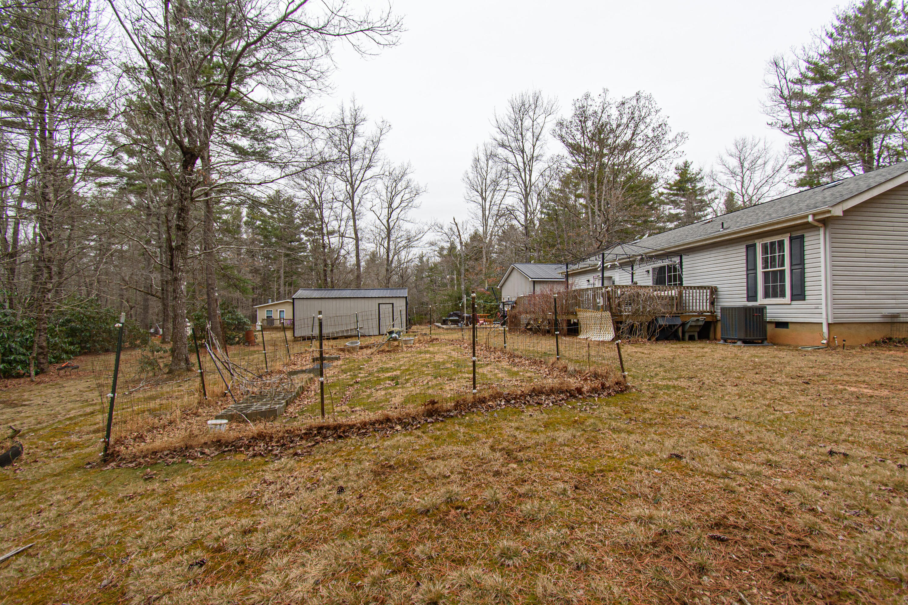 162 Mountain Laurel Way Northeast Check, VA 24072 - Photo 44 of 49 a white house that has a tree in front of it