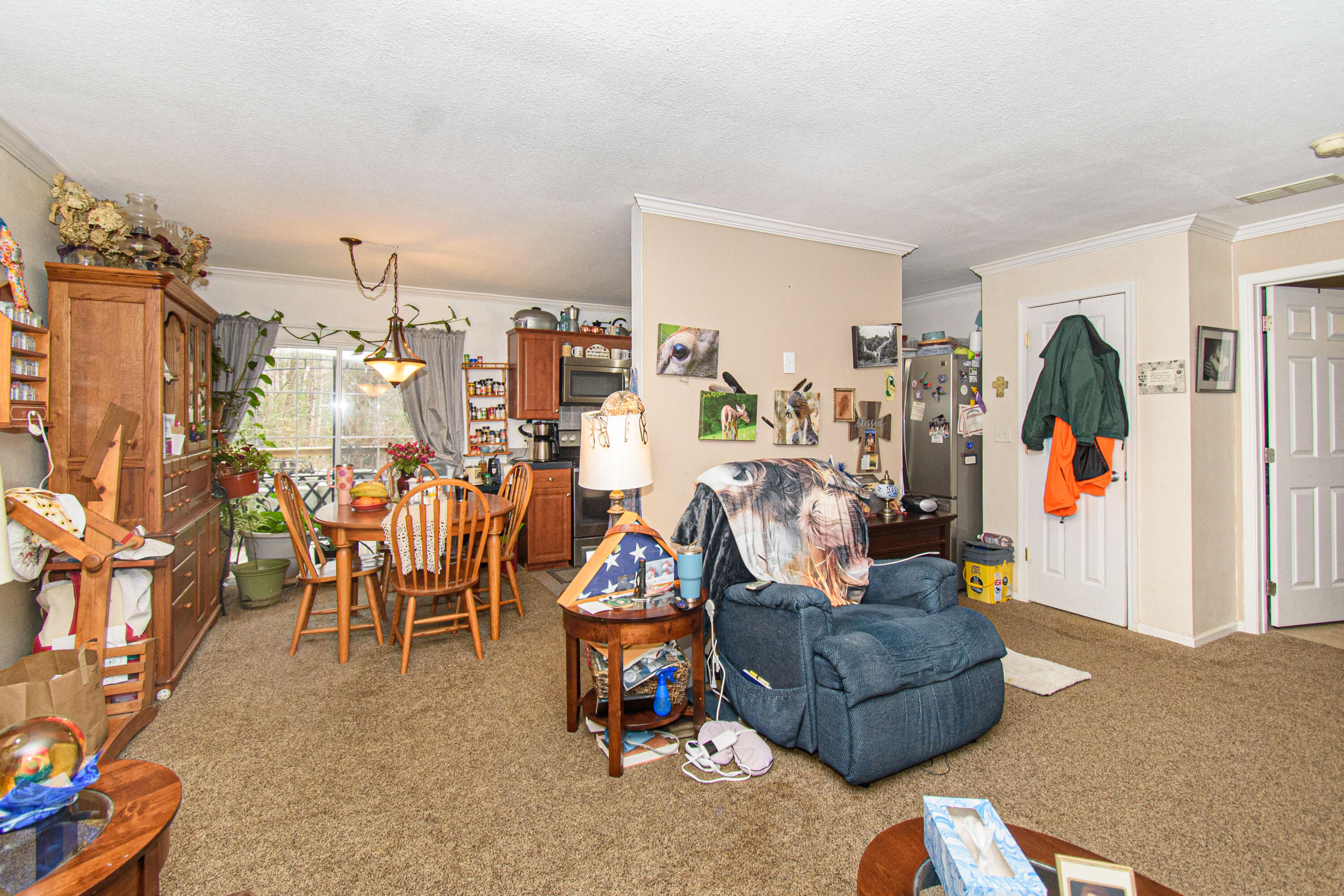 162 Mountain Laurel Way Northeast Check, VA 24072 - Photo 5 of 49 a living room with furniture and a flat screen tv