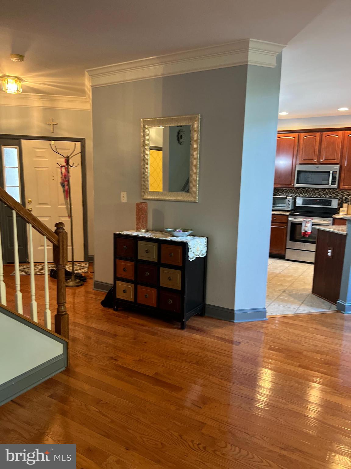 120 Dispatch Drive, Unit 77 Washington Crossing, PA 18977 - Photo 11 of 22 a living room with stainless steel appliances furniture and a kitchen view