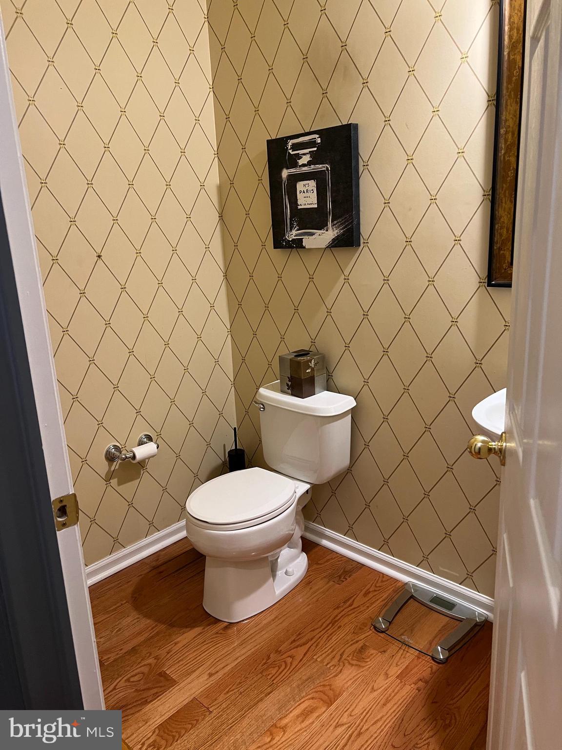 120 Dispatch Drive, Unit 77 Washington Crossing, PA 18977 - Photo 13 of 22 a bathroom with a toilet and a picture on the wall