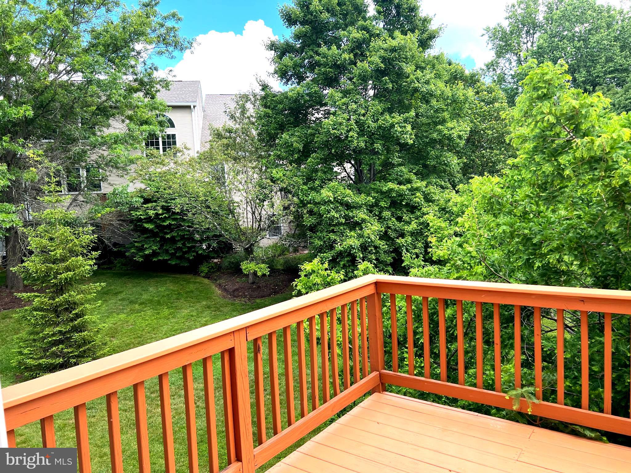 120 Dispatch Drive, Unit 77 Washington Crossing, PA 18977 - Photo 18 of 22 a balcony with trees in the background