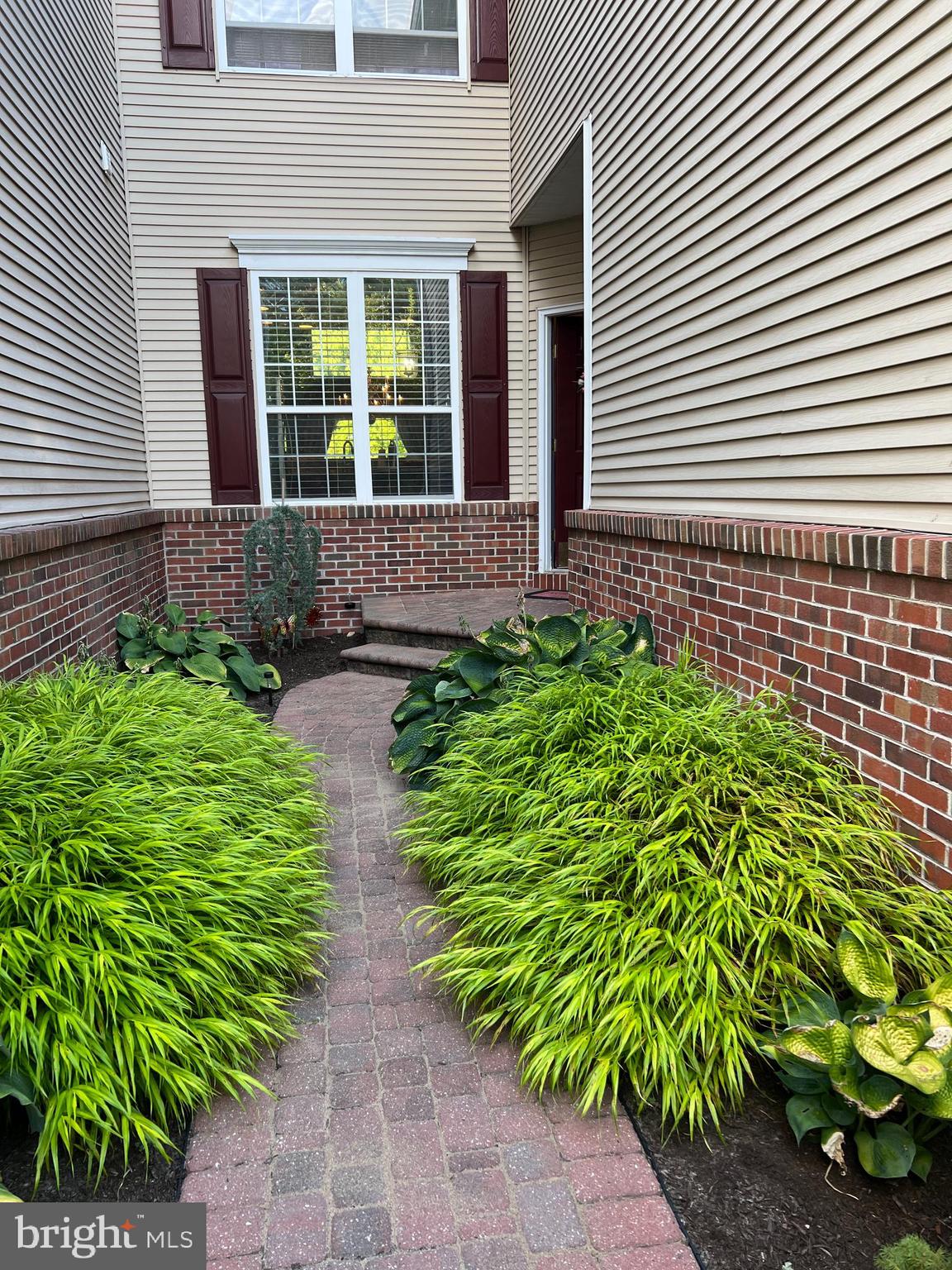 120 Dispatch Drive, Unit 77 Washington Crossing, PA 18977 - Photo 4 of 22 a view of a pathway with a house