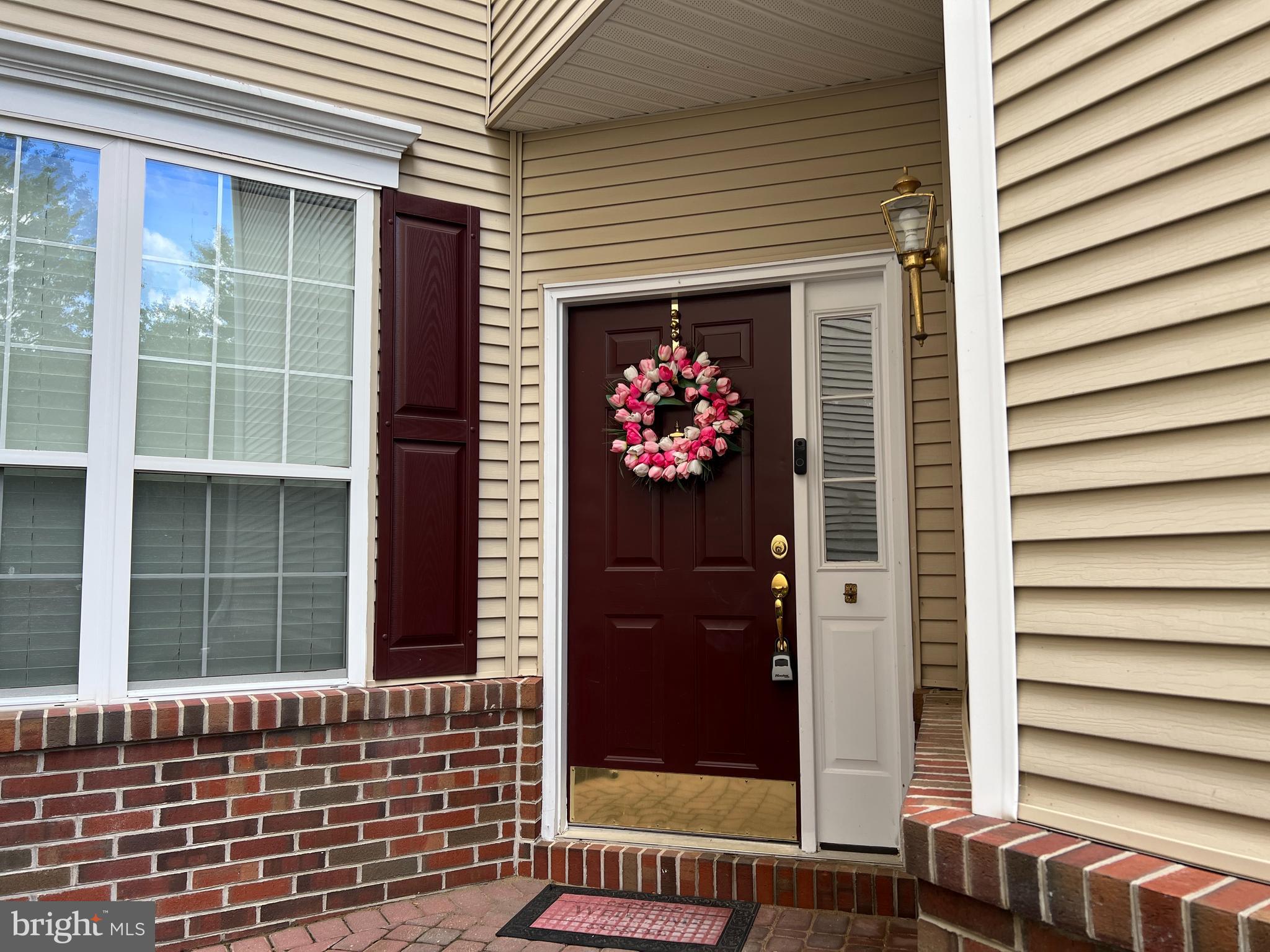 120 Dispatch Drive, Unit 77 Washington Crossing, PA 18977 - Photo 5 of 22 a front view of a house with a garage