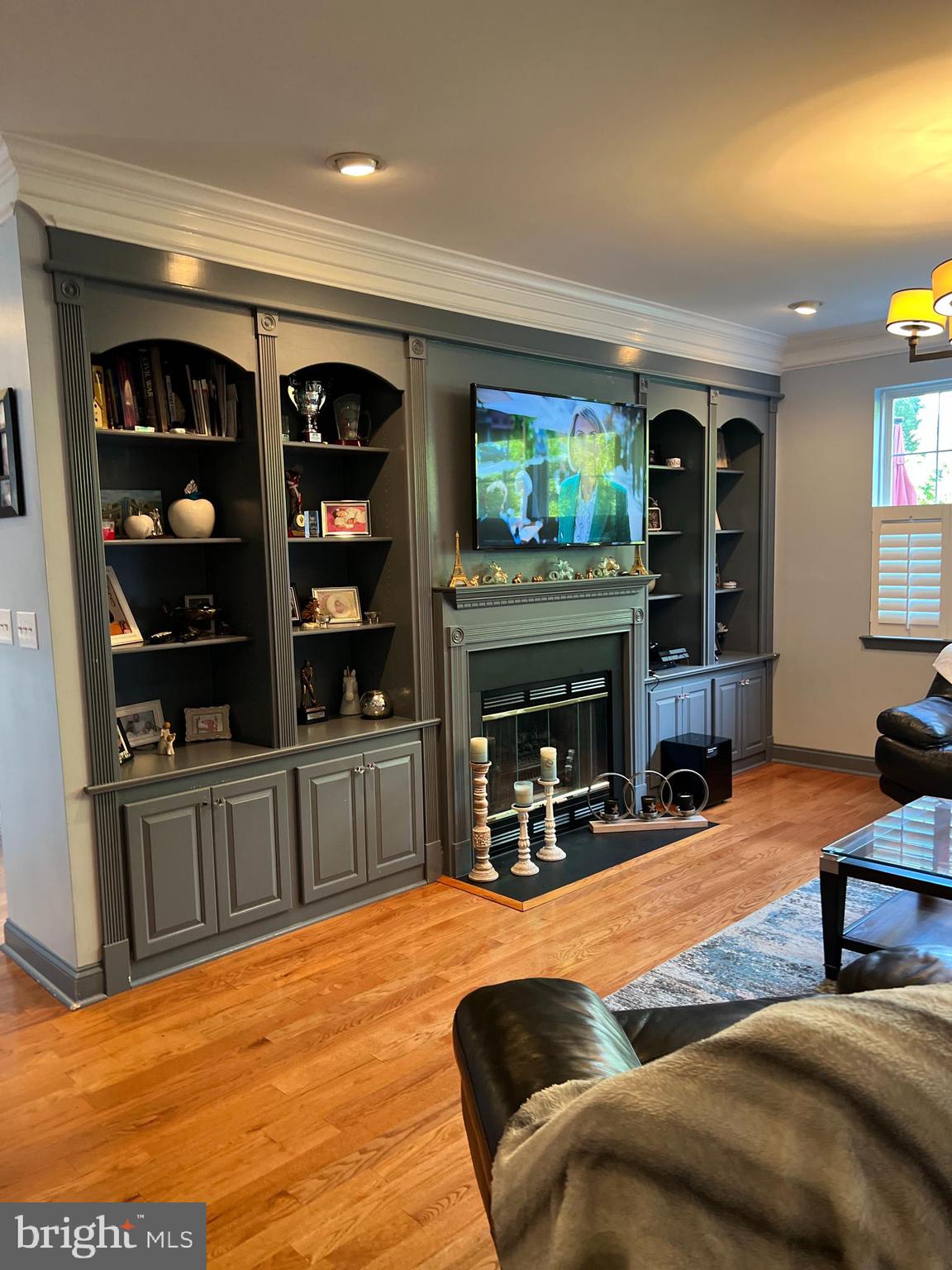 120 Dispatch Drive, Unit 77 Washington Crossing, PA 18977 - Photo 10 of 22 a living room with furniture a fireplace and a flat screen tv