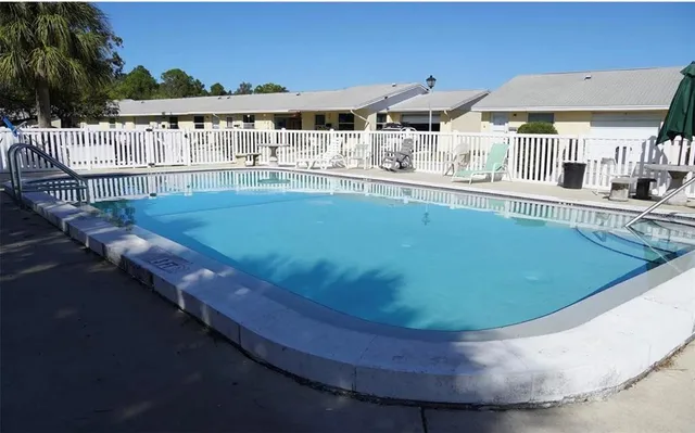 a view of a house with a swimming pool