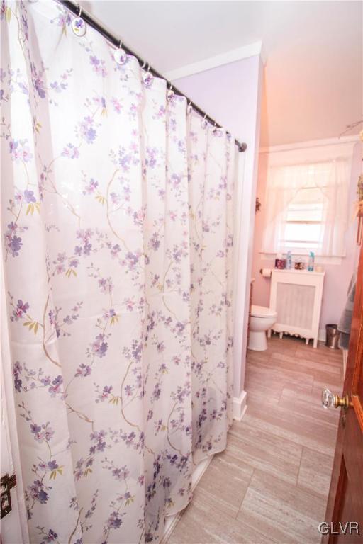 1139 Spring Garden Street Easton, PA 18042 - Photo 20 of 26 a bathroom with a shower curtain