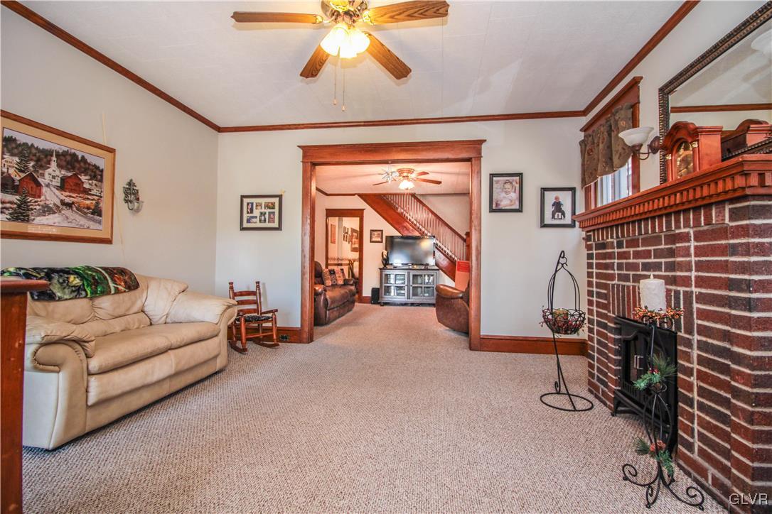 1139 Spring Garden Street Easton, PA 18042 - Photo 3 of 26 a living room with furniture and a window