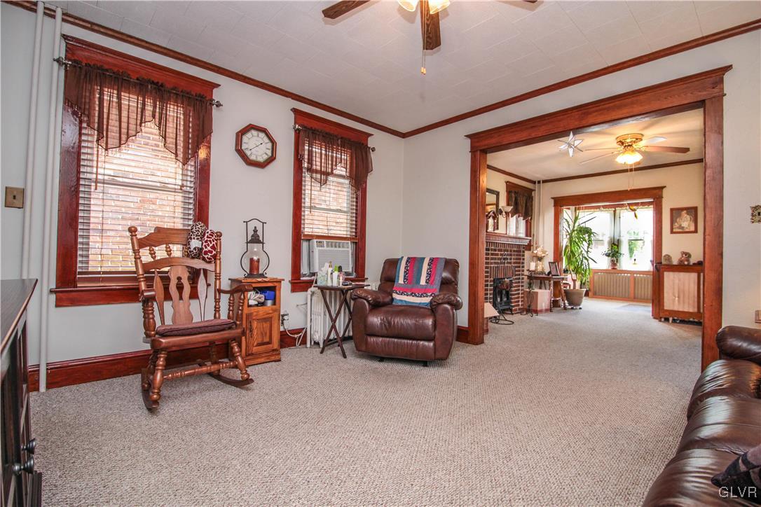 1139 Spring Garden Street Easton, PA 18042 - Photo 8 of 26 a view of a livingroom with furniture and a window