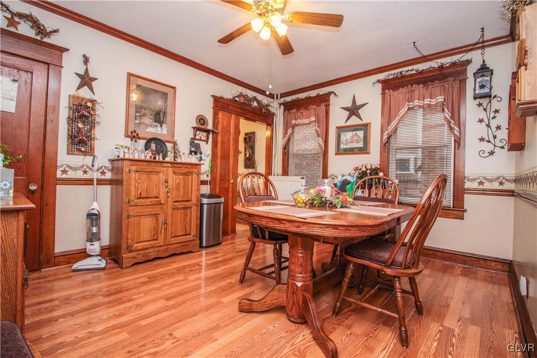 1139 Spring Garden Street Easton, PA 18042 - Photo 9 of 26 a view of a dining room with furniture window and wooden floor