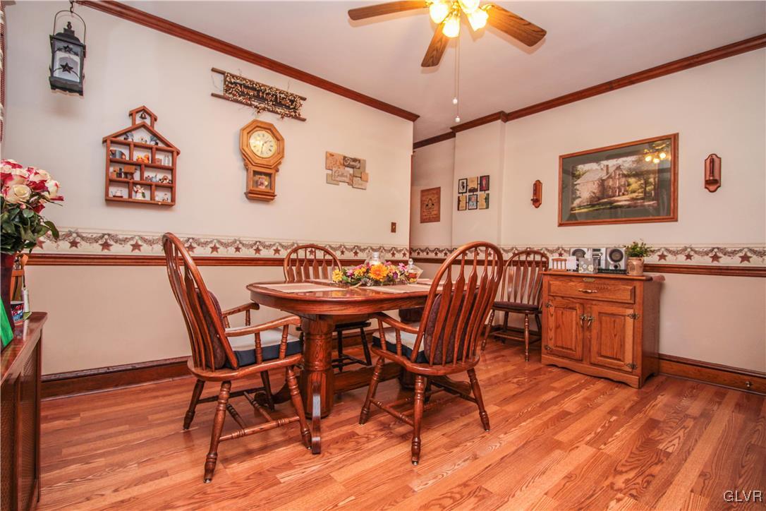 1139 Spring Garden Street Easton, PA 18042 - Photo 10 of 26 a view of a dining room with furniture and wooden floor