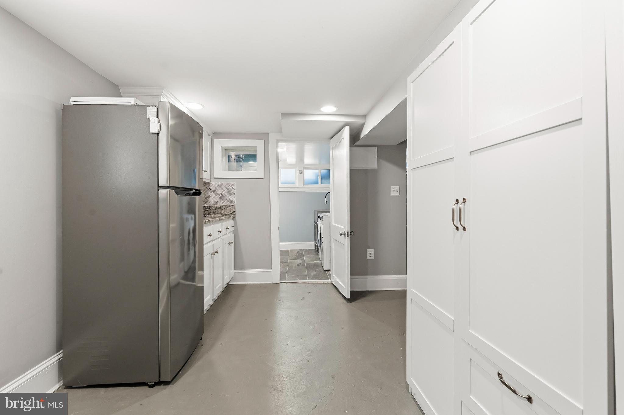 148 Todd Place Northeast Washington, DC 20002 - Photo 28 of 43 a view of a refrigerator in kitchen and a sink