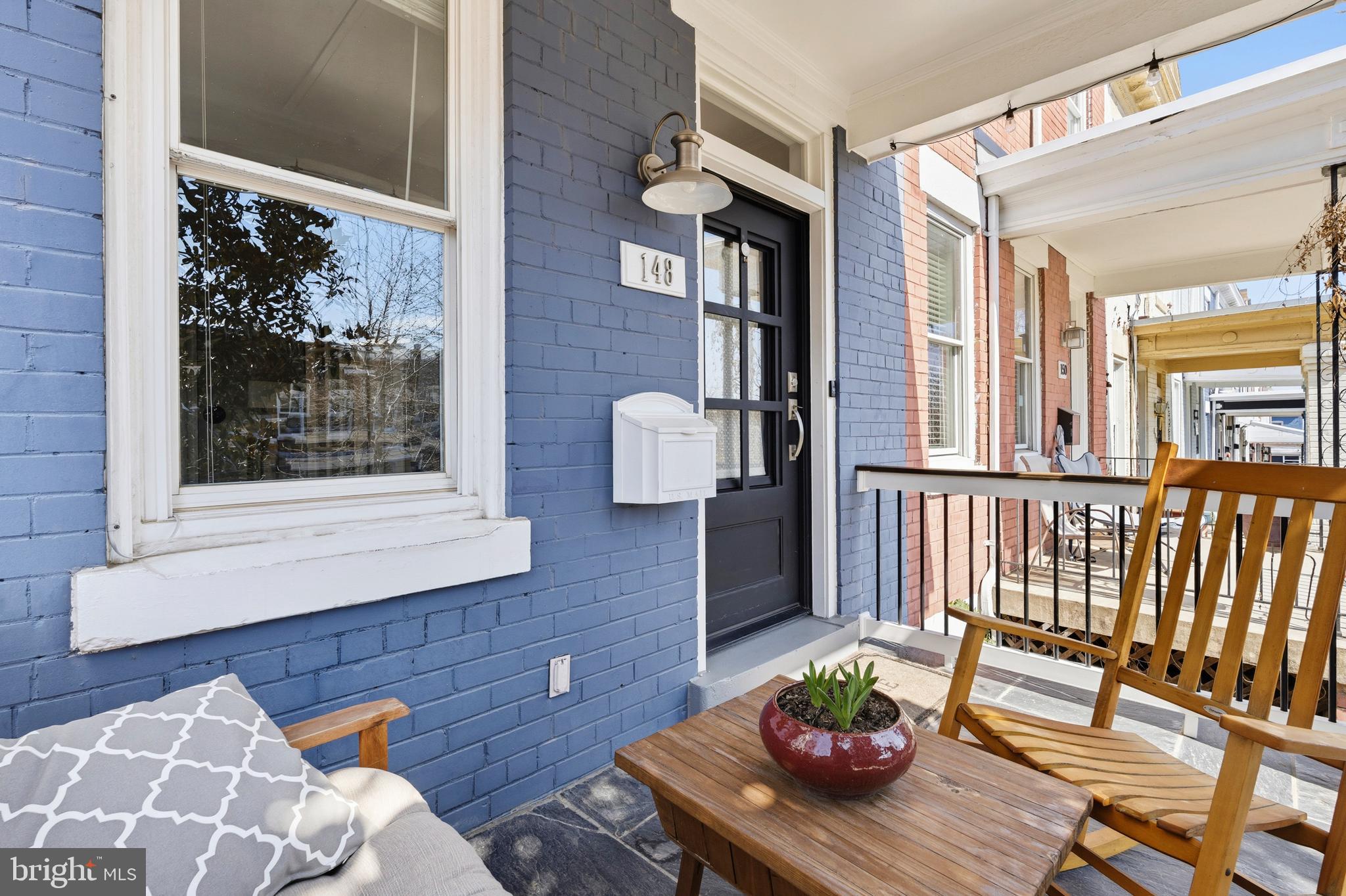 148 Todd Place Northeast Washington, DC 20002 - Photo 5 of 43 a living room with furniture and a potted plant