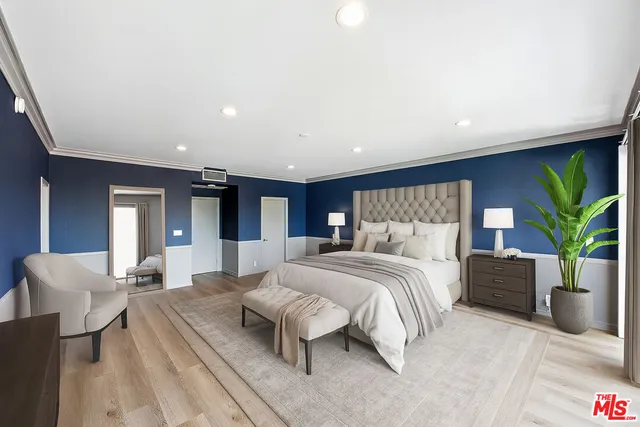 a view of a balcony with potted plants
