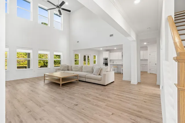 a living room with furniture and a table