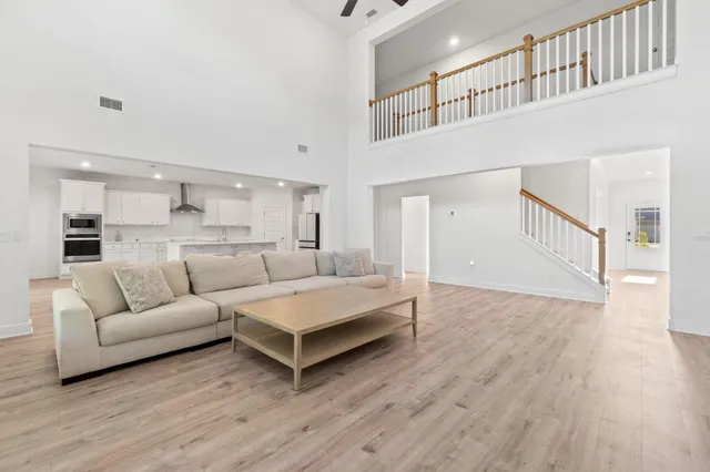 a white bath tub sitting next to a window
