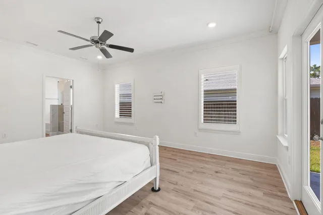a bathroom with a sink a toilet and vanity