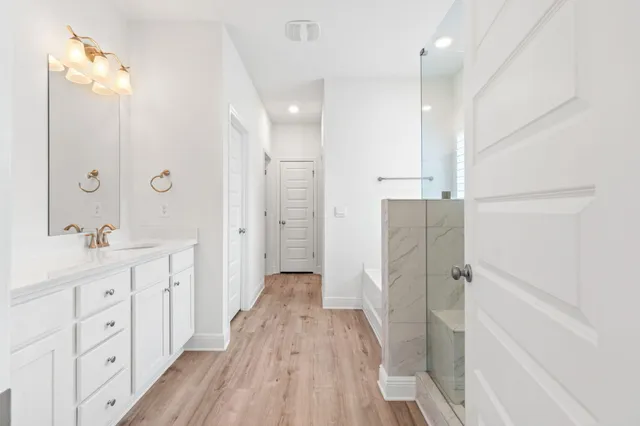 a view of storage and utility room with washer and dryer