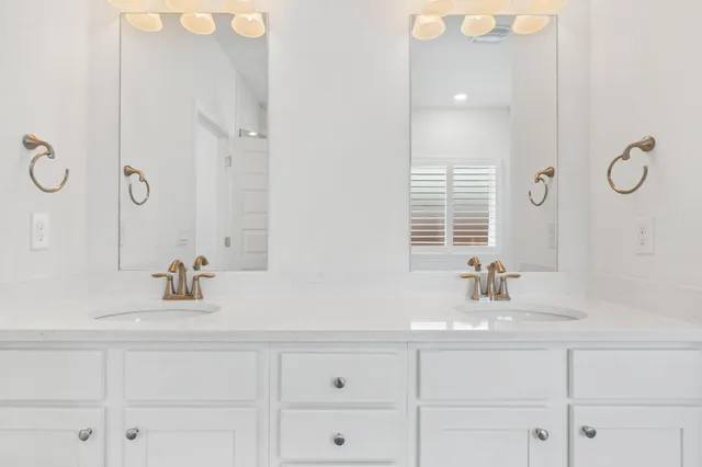 a view of a hallway with windows