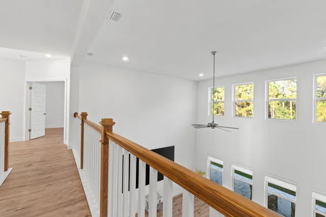 an aerial view of a house with a lake view