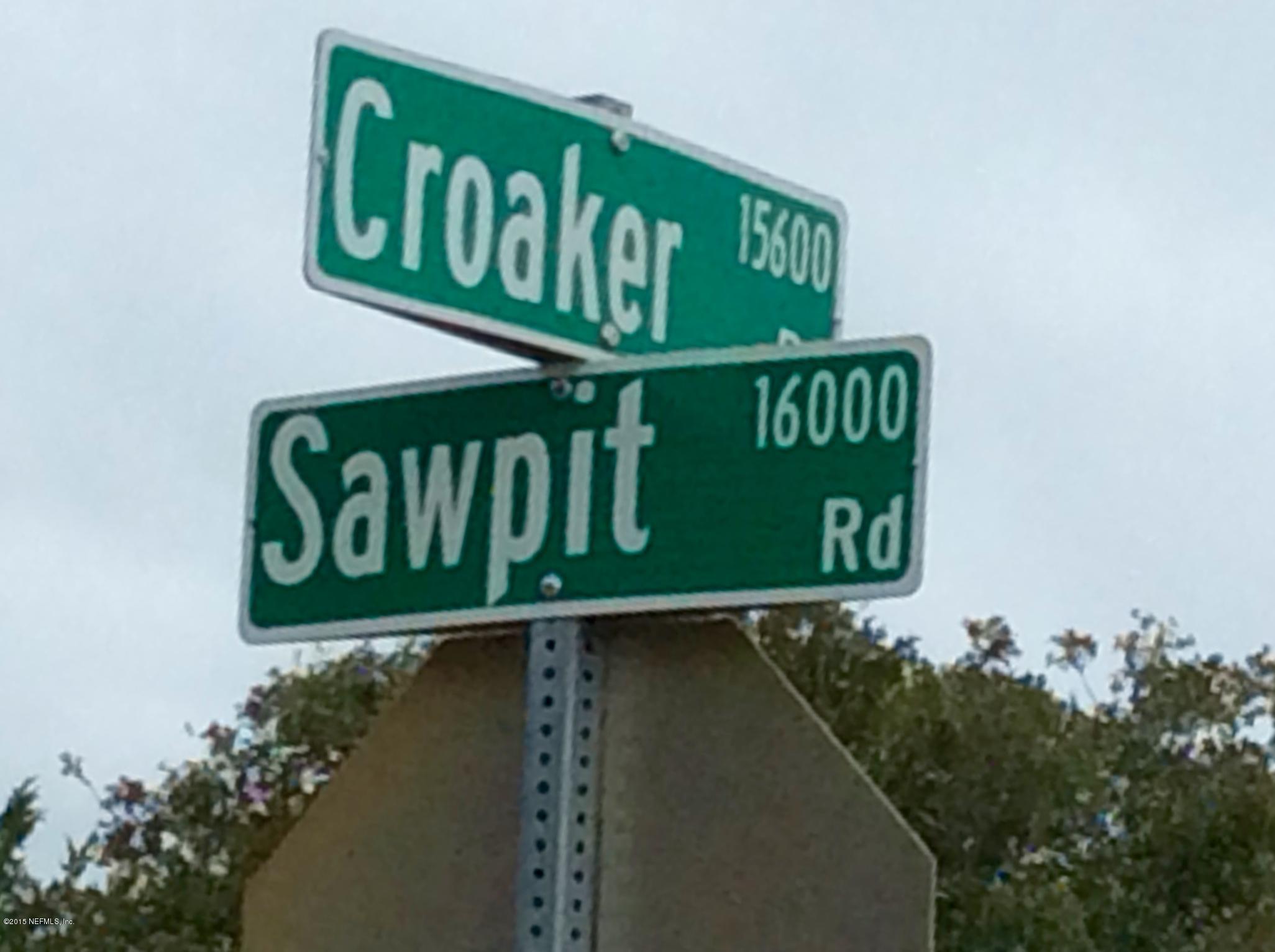 15968 Croaker Road Jacksonville, FL 32226 - Photo 3 of 8 a street sign that is on a pole