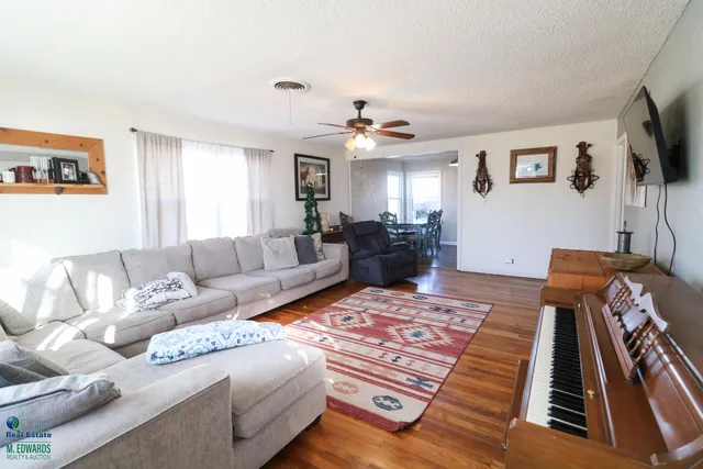 a kitchen with cabinets a sink and appliances