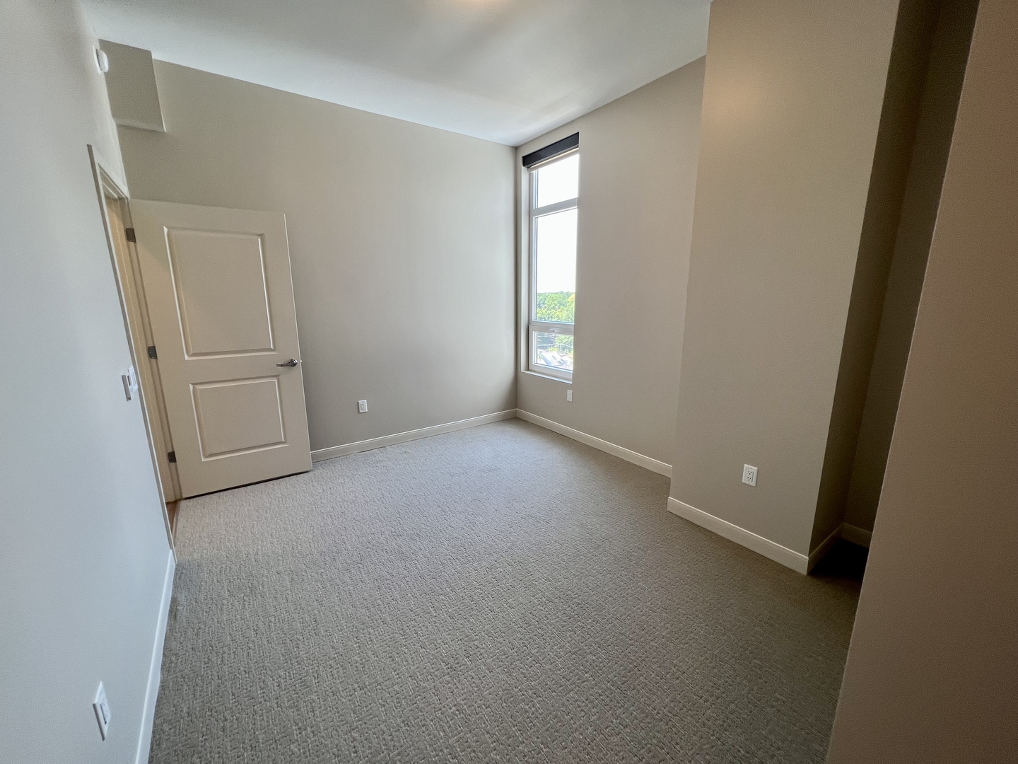 703 Madison Street, Unit 526 Oak Park, IL 60302 - Photo 15 of 29 an empty room with windows and closet