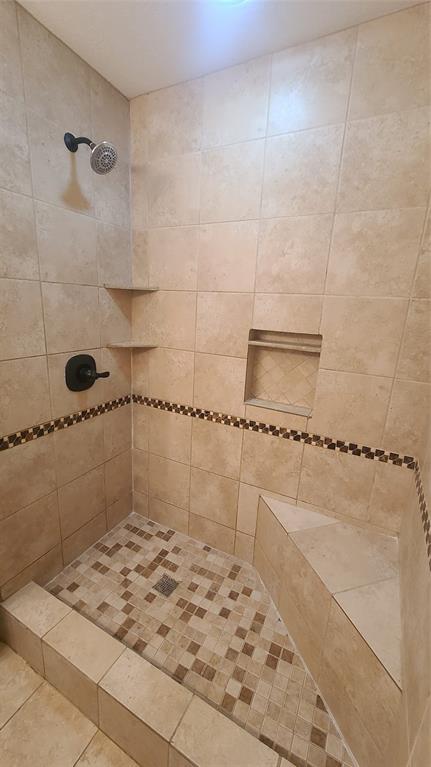 2728 Cross Bend Road Plano, TX 75023 - Photo 13 of 17 a bathroom with a shower