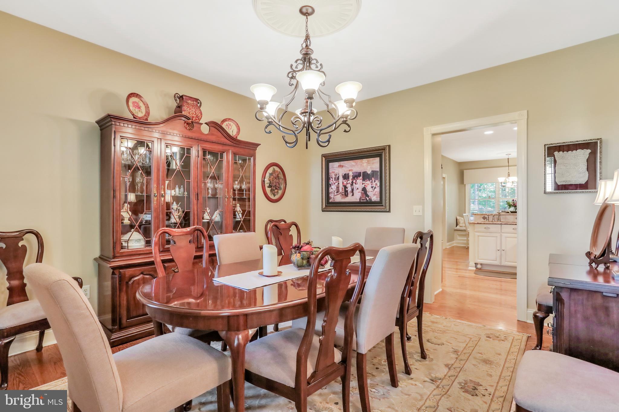 92 Earle Road Charles Town, WV 25414 - Photo 23 of 82 Formal Dining room with kitchen view