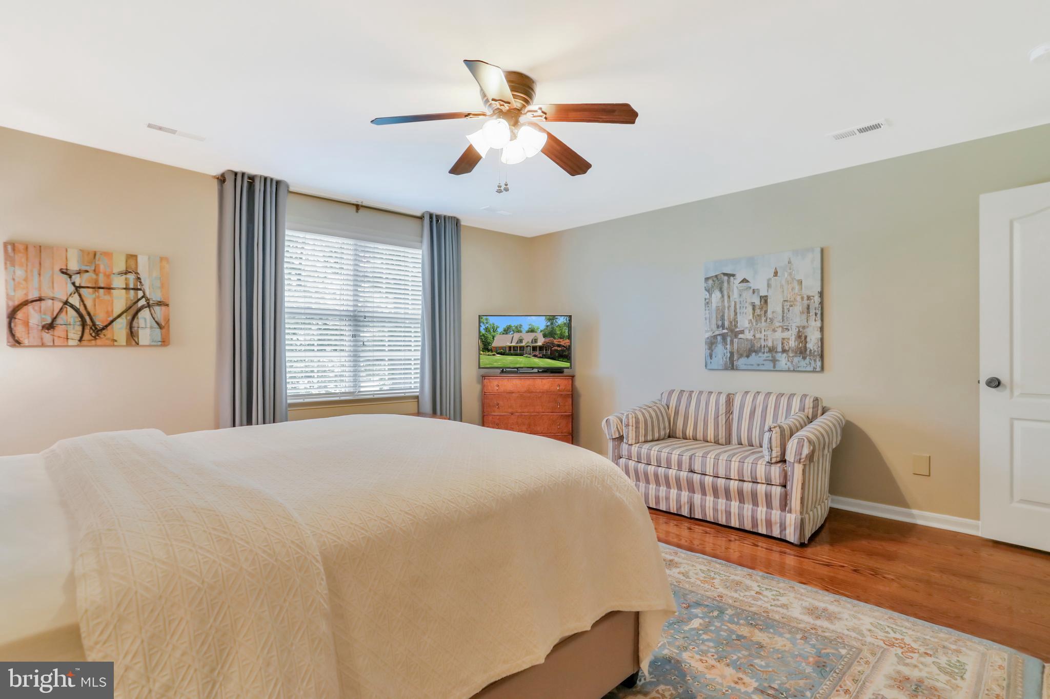 92 Earle Road Charles Town, WV 25414 - Photo 53 of 82 Upper level bedroom with ceiling fan/light