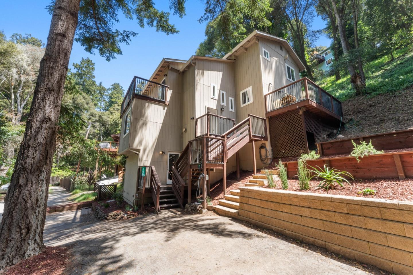 140 Baker Road Aptos, CA 95003 - Photo 49 of 62 a view of a house with a yard and large tree