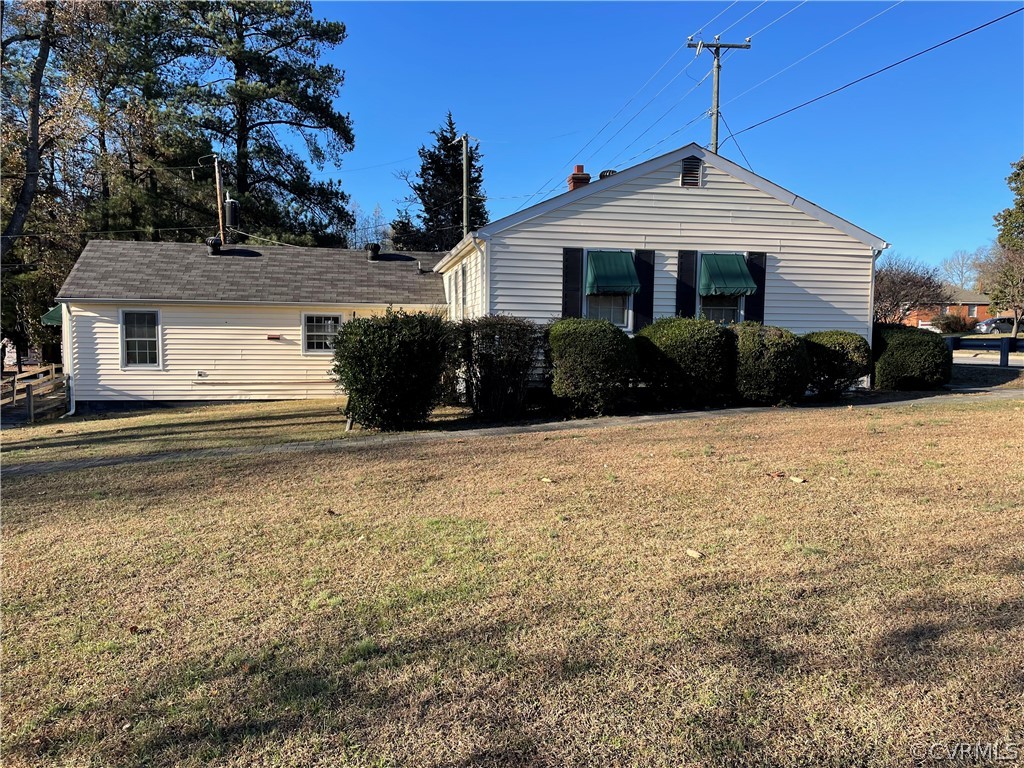 10271 Robious Road Richmond, VA 23235 - Photo 2 of 14 Side of Home with Addition on the Rear