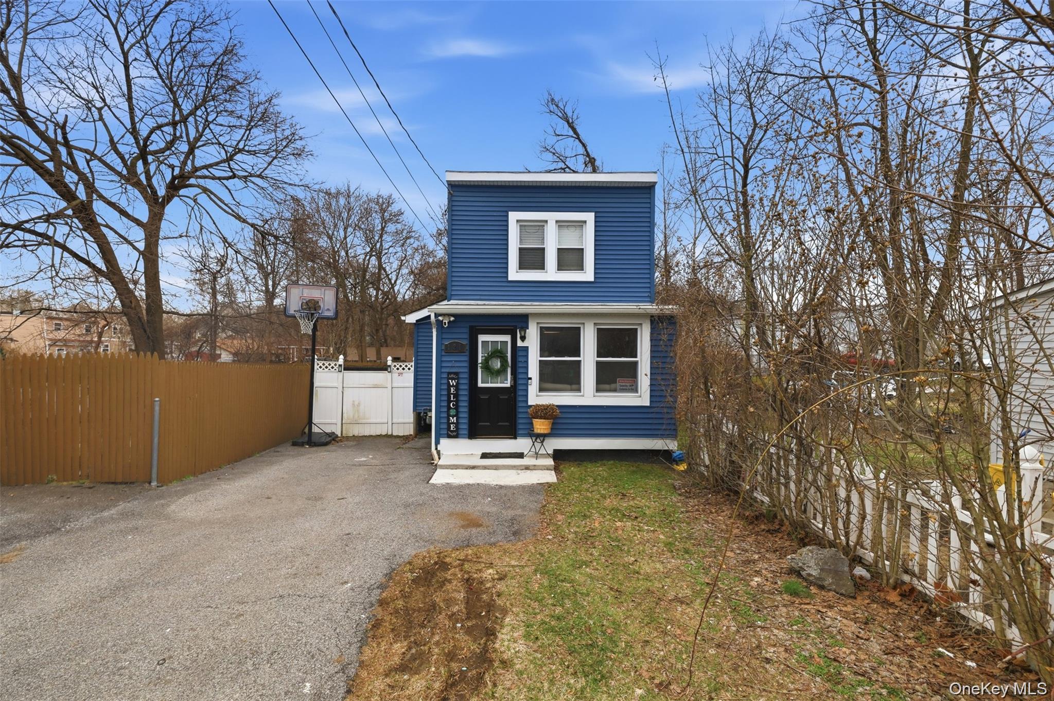 121 Little Britain Road Newburgh, NY 12550 - Photo 1 of 15 a front view of a house with a yard