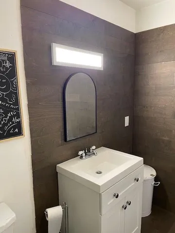 a bathroom with a sink and a toilet
