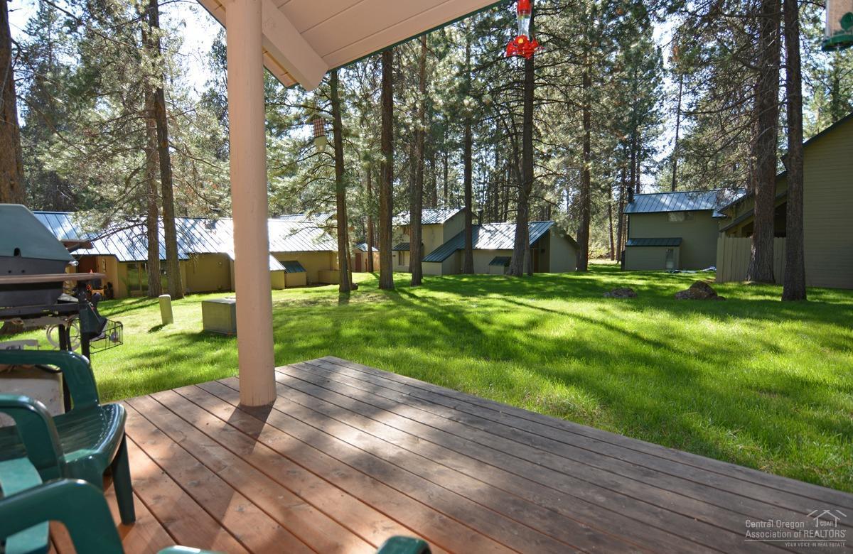 57515 Ranch Cabin Road, Unit B15 Sunriver, OR 97707 - Photo 3 of 21 Deck for relaxing or entertaining. Lush