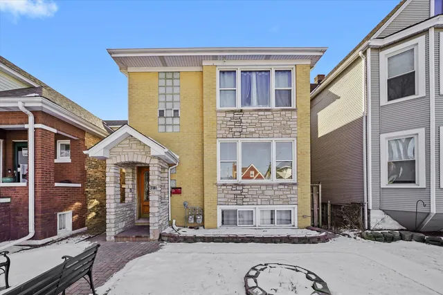 a front view of a house with a patio