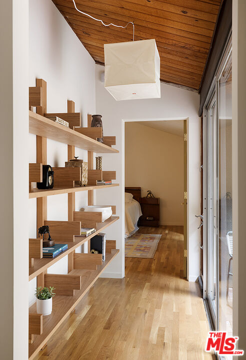 390 North San Rafael Avenue Pasadena, CA 91105 - Photo 14 of 39 a view of a living room and workspace
