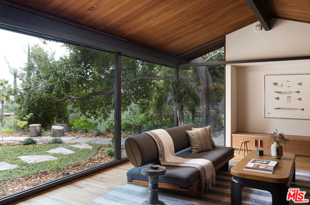 390 North San Rafael Avenue Pasadena, CA 91105 - Photo 2 of 39 a outdoor living space with furniture and garden view