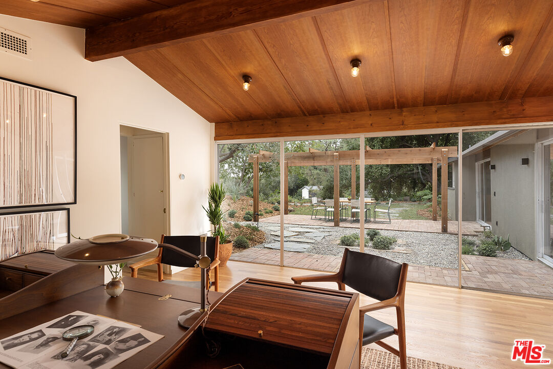 390 North San Rafael Avenue Pasadena, CA 91105 - Photo 28 of 39 a living room with furniture and a large window
