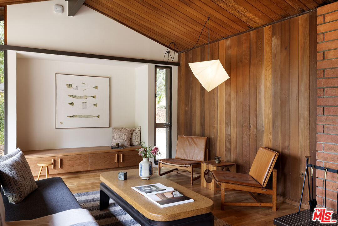 390 North San Rafael Avenue Pasadena, CA 91105 - Photo 3 of 39 a living room with furniture and a window