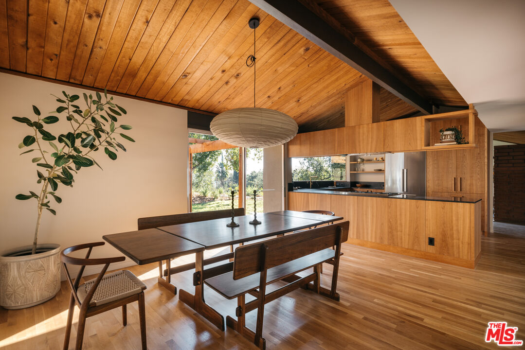 390 North San Rafael Avenue Pasadena, CA 91105 - Photo 6 of 39 a dining room with furniture and wooden floor