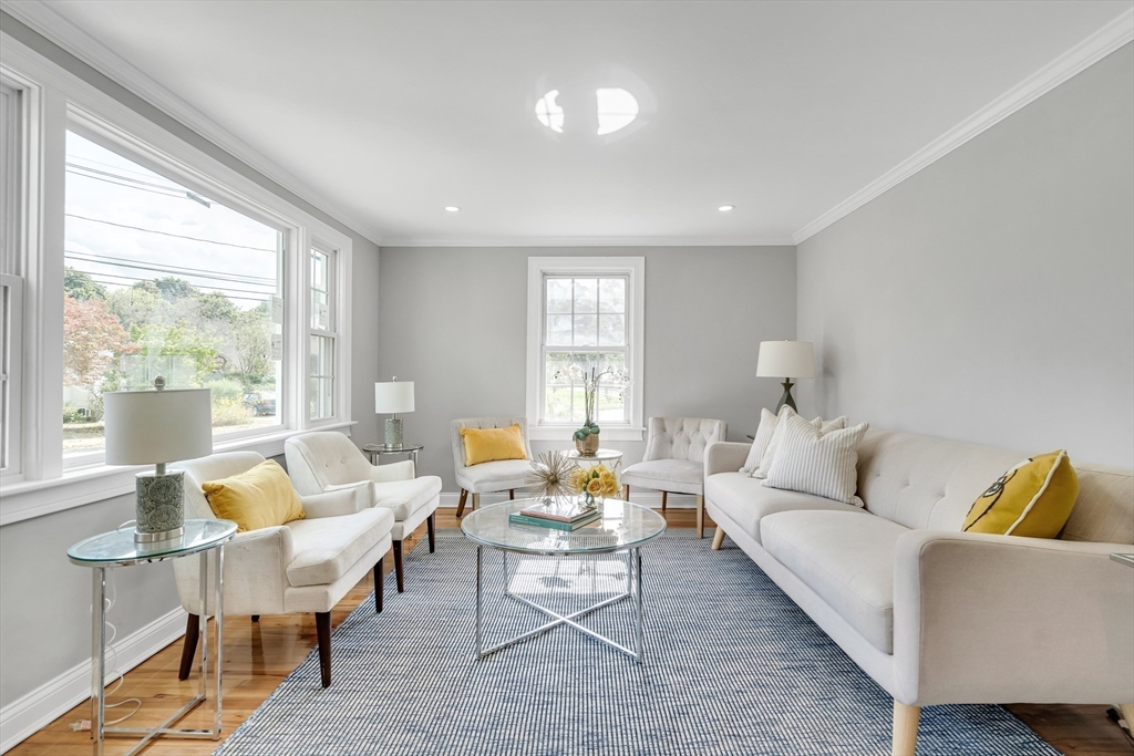39 Abbott Road Waltham, MA 02452 - Photo 2 of 18 a living room with furniture and a large window