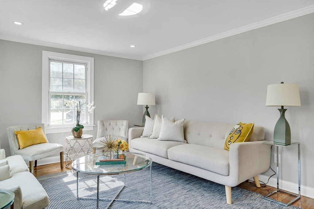 39 Abbott Road Waltham, MA 02452 - Photo 3 of 18 a living room with furniture and a lamp