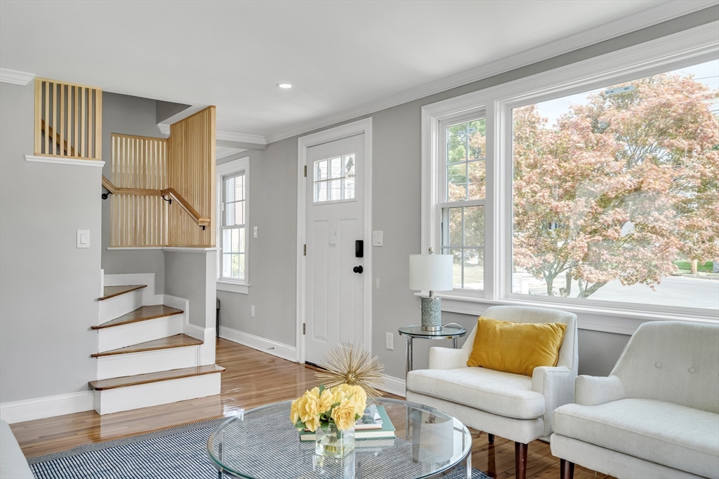 39 Abbott Road Waltham, MA 02452 - Photo 4 of 18 a living room with furniture and a large window