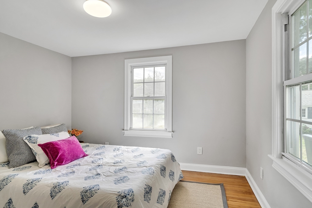 39 Abbott Road Waltham, MA 02452 - Photo 10 of 18 a bedroom with a bed and a window