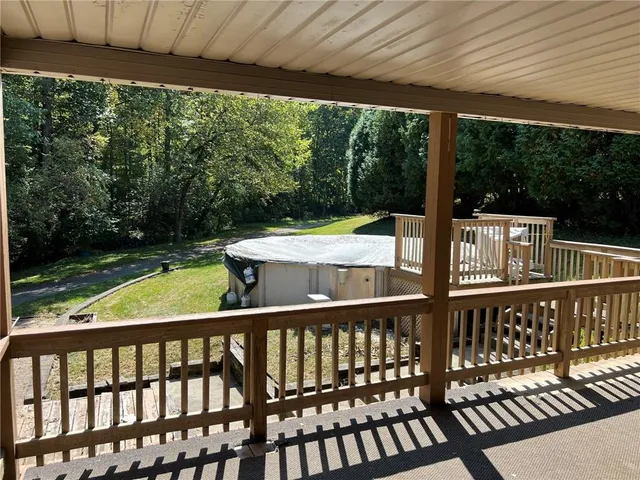 a view of a two chairs in the deck