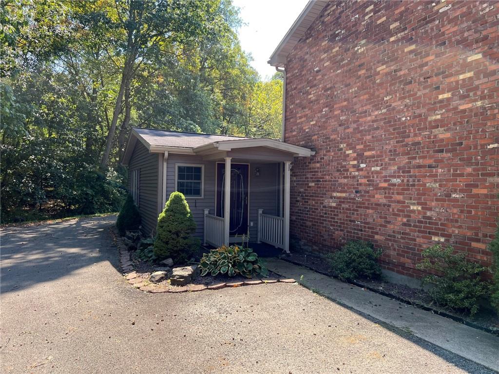 470 Donohoe Road Greensburg, PA 15601 - Photo 17 of 31 a front view of a house with garden