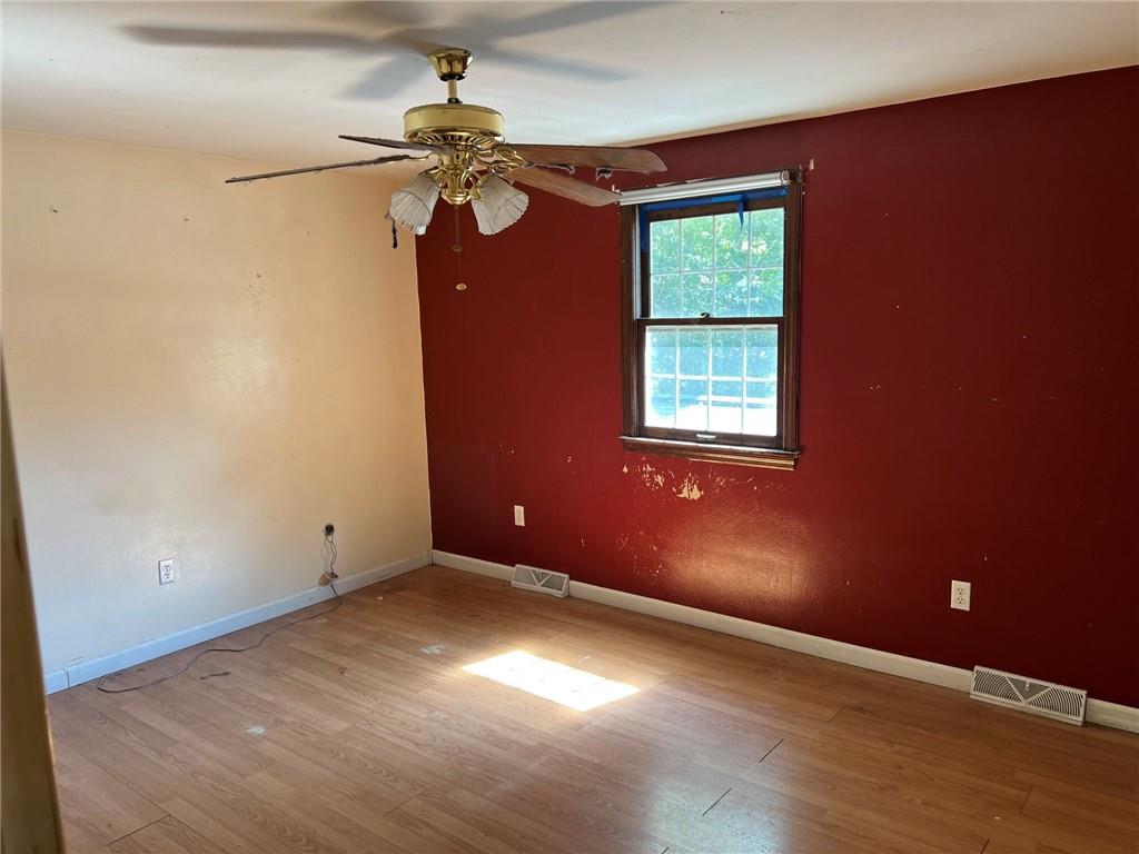470 Donohoe Road Greensburg, PA 15601 - Photo 9 of 31 a view of an empty room with a window
